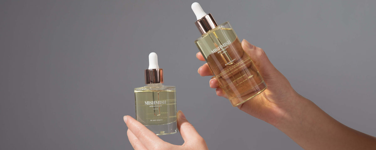 MishMish Apricot and Date Hair Oil 50ml and 100ml bottles, wide hero crop